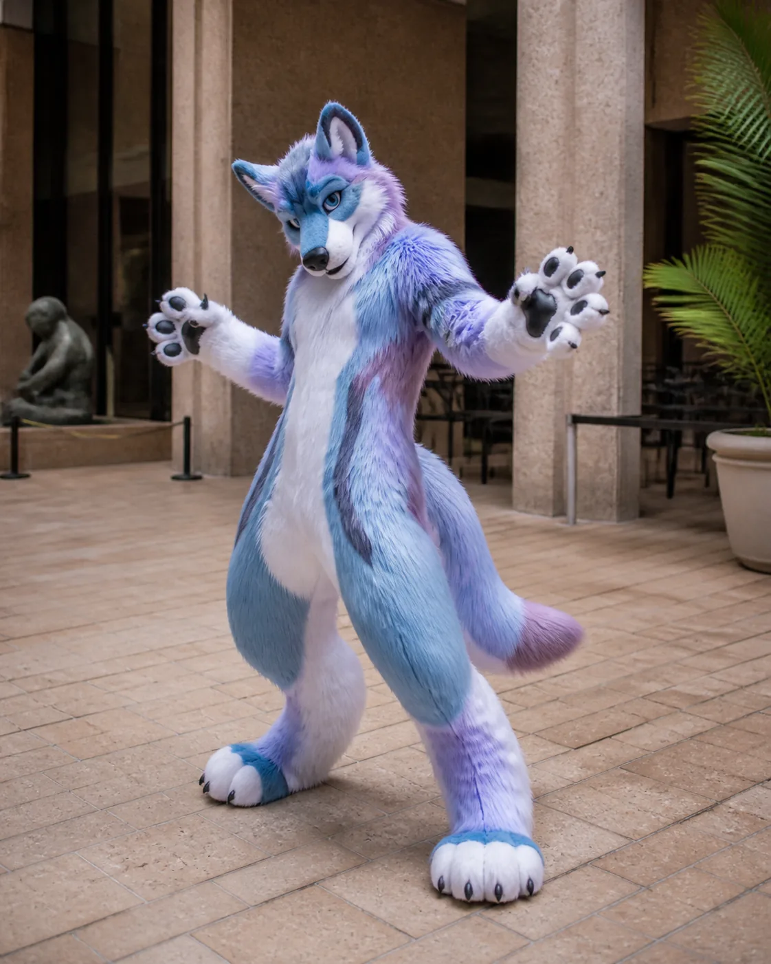 Performer in a premium blue and lilac handmade fursuit